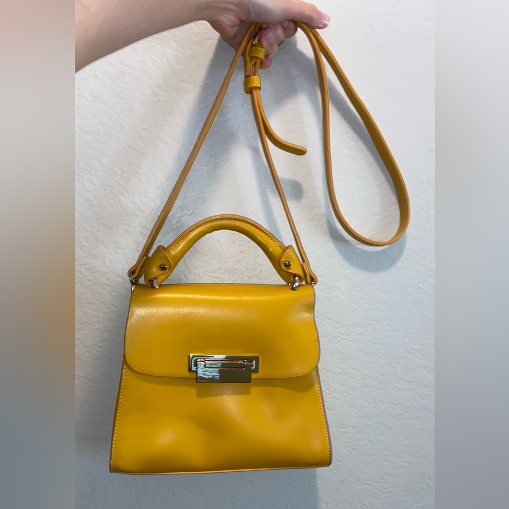 Women’s small top handle handbag